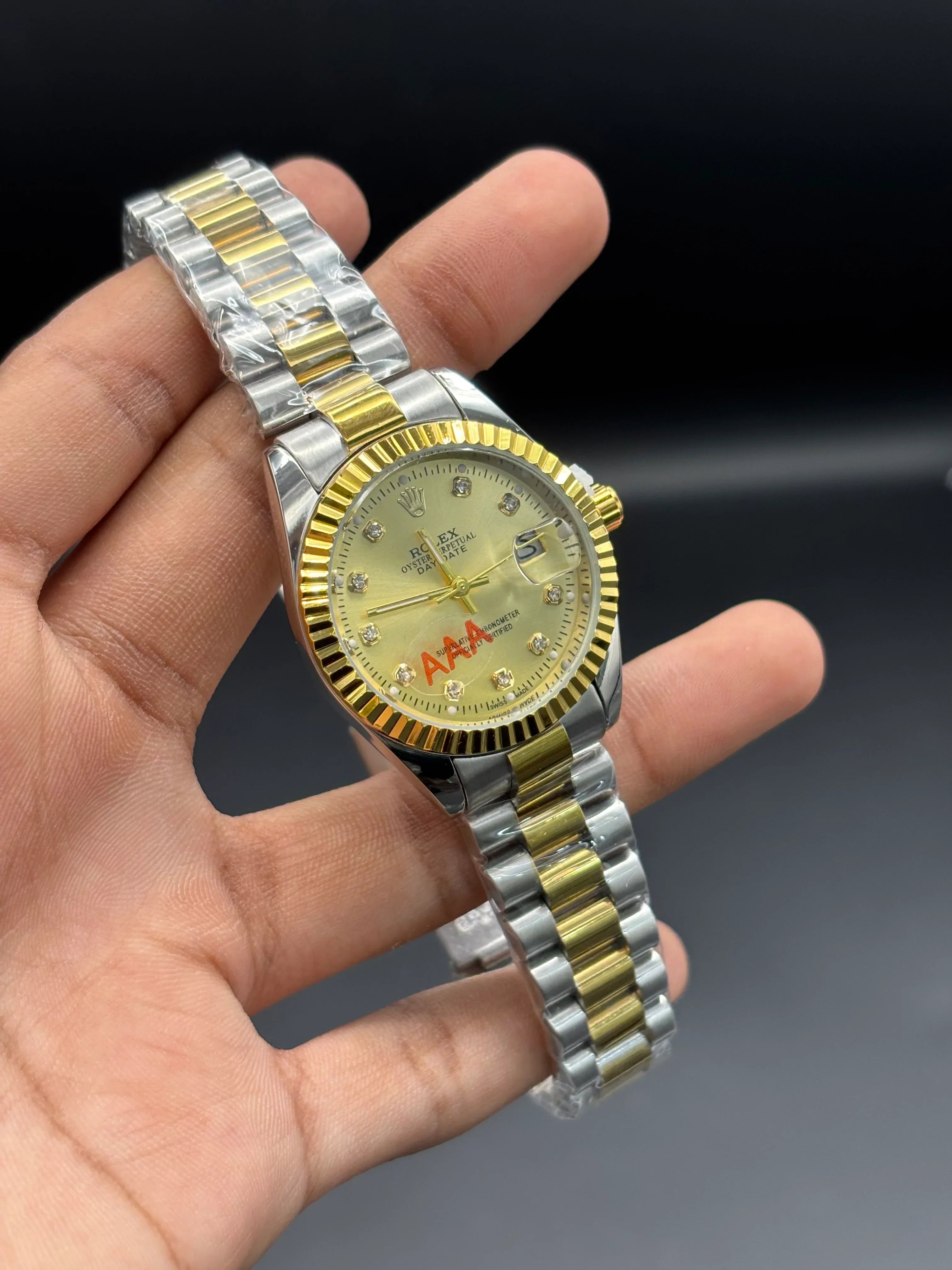 Rolex Datejust 31 – Two-Tone Oystersteel & 18ct Yellow Gold with Champagne Diamond Dial - elapse