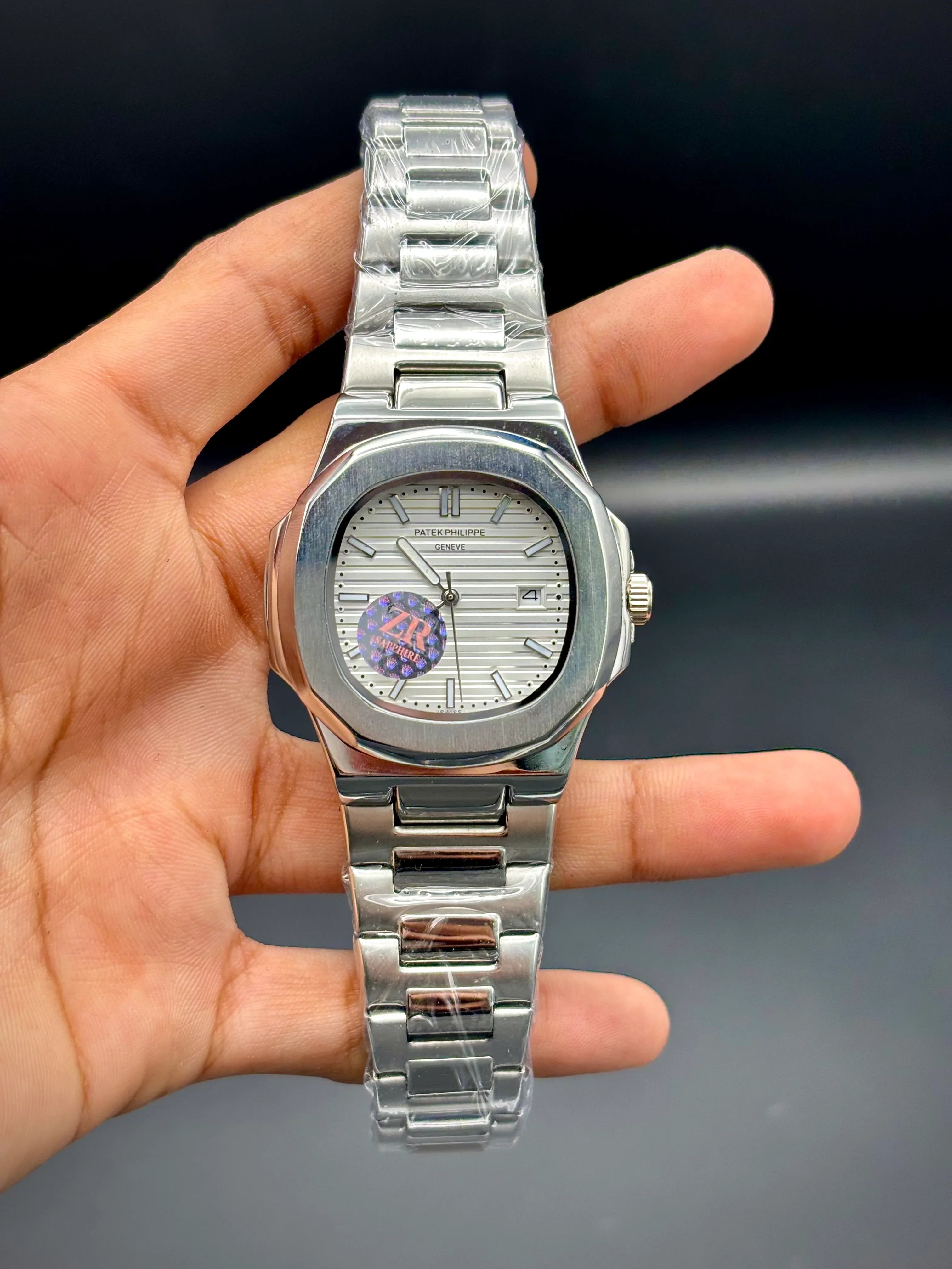 Patek Philippe Nautilus Stainless Steel – White Embossed Dial with Date - elapse