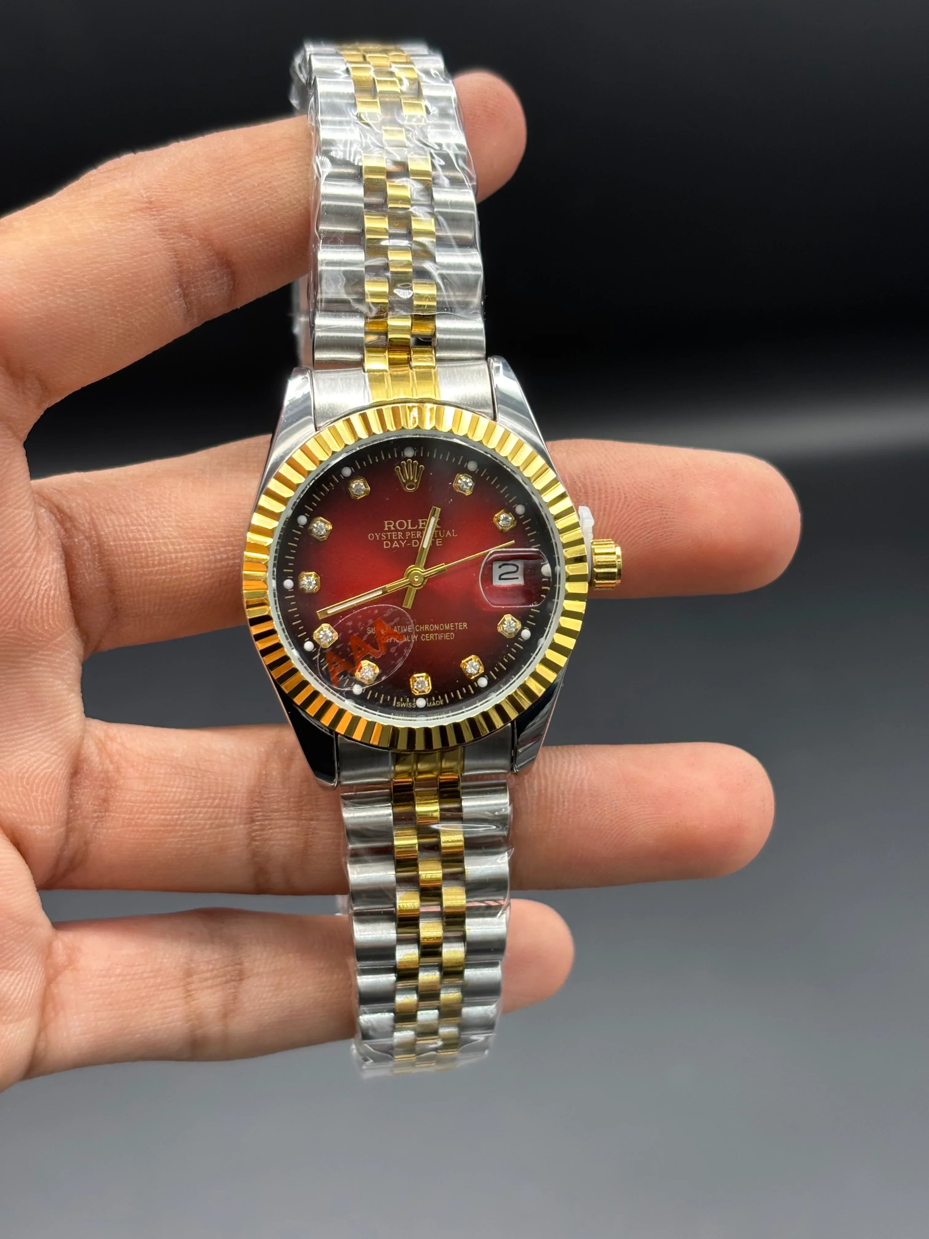 Rolex Datejust 36 – Two-Tone Gold & Steel with Red Vignette Diamond Dial - elapse