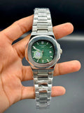 Patek Philippe Nautilus Stainless Steel – Green Embossed Dial with Date - elapse