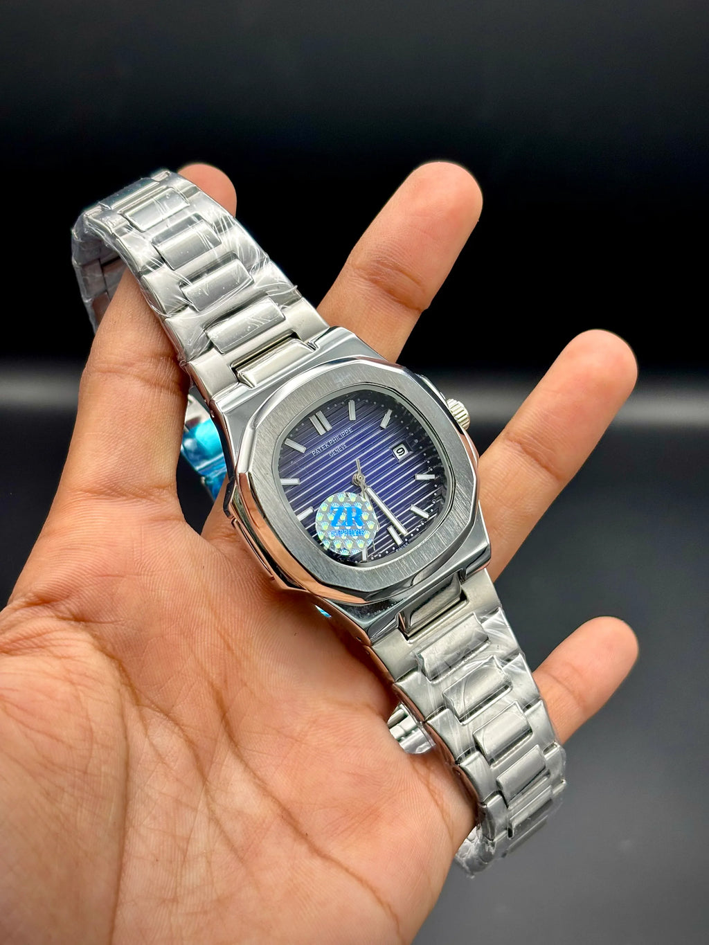 Patek Philippe Nautilus Stainless Steel – Blue Embossed Dial with Date - elapse