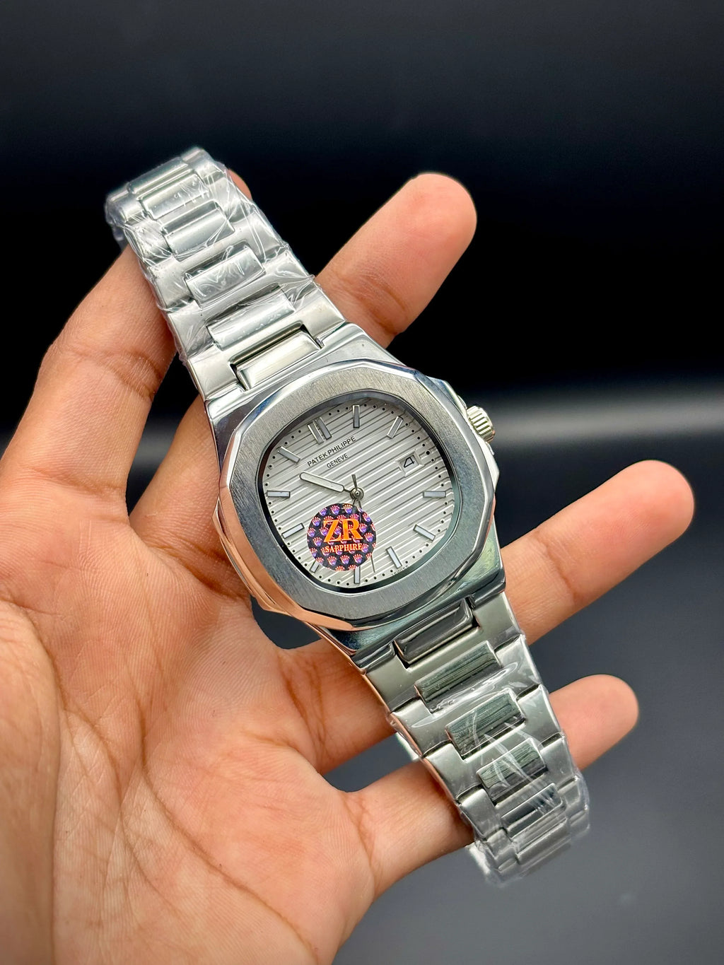 Patek Philippe Nautilus Stainless Steel – White Embossed Dial with Date - elapse