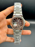 Patek Philippe Nautilus Stainless Steel – Brown Embossed Dial with Date - elapse