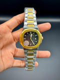 Patek Philippe Nautilus – Grey Dial with Gold Case & Two-Tone Bracelet - elapse
