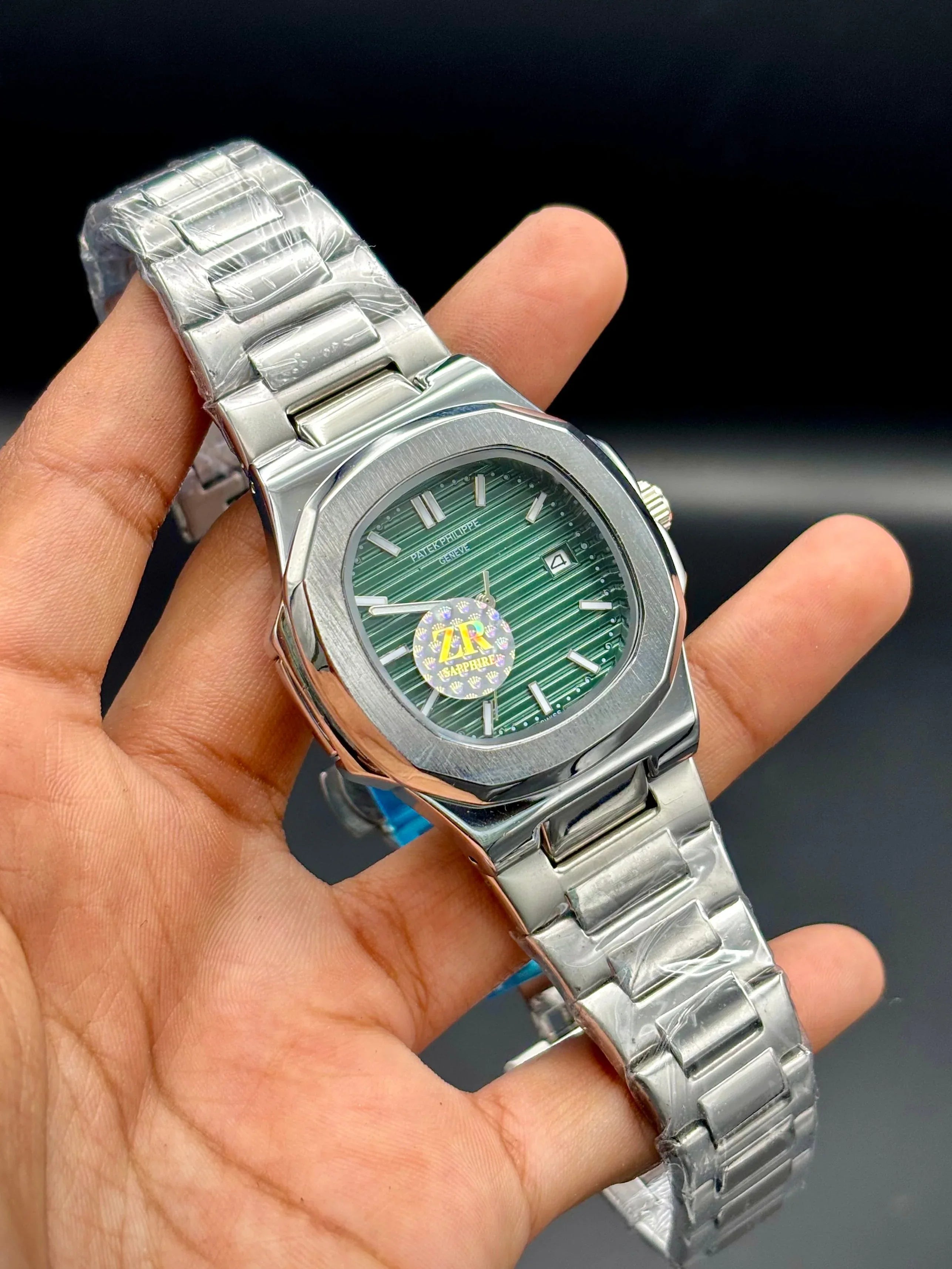 Patek Philippe Nautilus Stainless Steel – Green Embossed Dial with Date - elapse