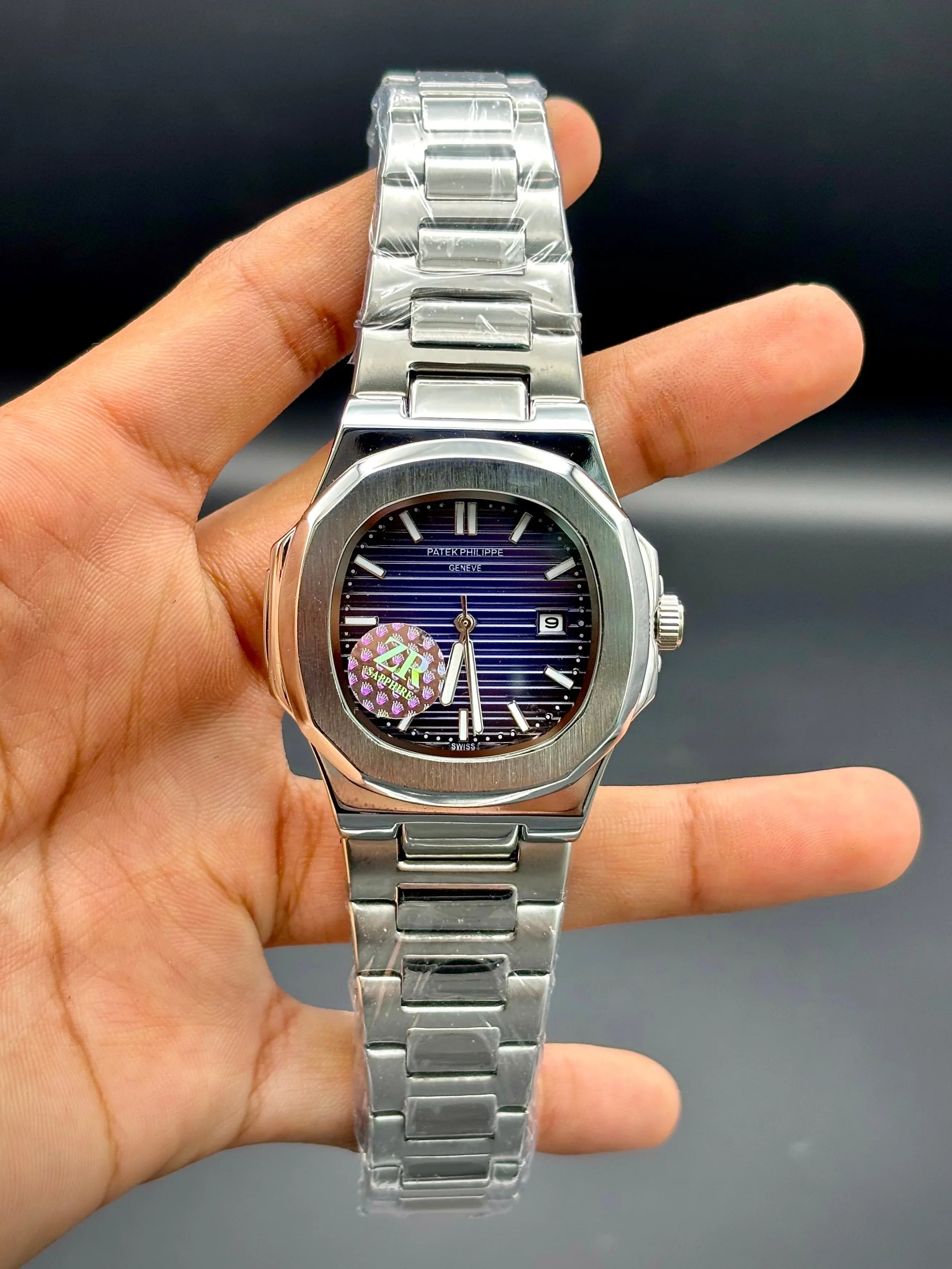Patek Philippe Nautilus Stainless Steel – Blue Embossed Dial with Date - elapse